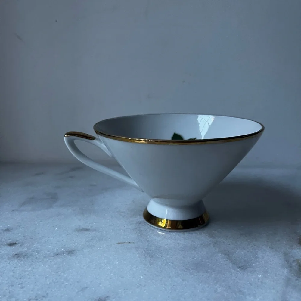 Elegant White floral Teacup with Gold Trim